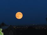 Supermoon Over City