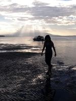 A Girl Under The Sunset Sea