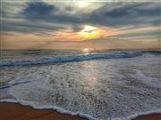 Sunset And Waves
