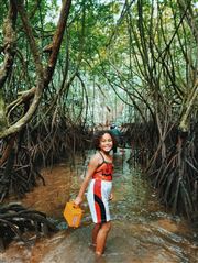 Local Palauan Girl In Mangrove Jungle