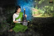 Green Mon Traditional Dress And Mon Instrument