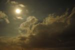 Moon On The Cloudy Sky