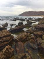 Rocky Coast Of Praia Da Gralha