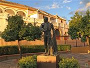 Bullring And Statue Of Bull Fighter