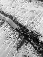 Greenland Ice River From An Airplane
