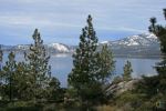 Lake Tahoe View Of Mountains Through Trees