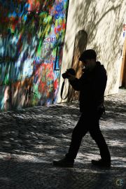 Photographer Silhouette At Lennon Wall