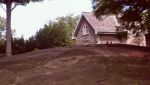 House On Top Of Hill In Botanical Garden