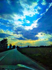 Marvelous Sunset While Driving On The Road