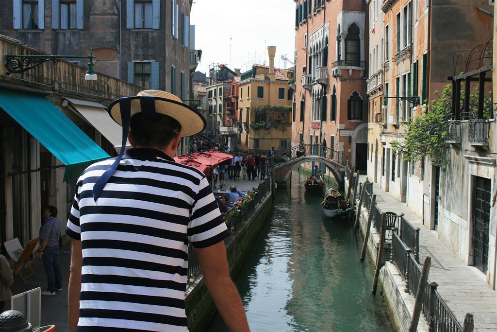 Venetian Man Overlooking Venice Canals