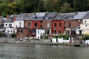 Colorful Buildings Along The River Meuse