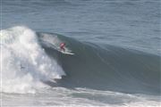 Surfer At Nazare Big Wave Tour Challenge
