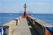 The Amalfi Pier And A Boat