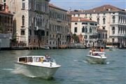 Two Boats Speeding Along The Grand Canal
