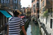 Venetian Man Overlooking Venice Canals