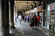 Walking By The Stores Of Venice 