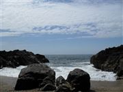 Dark Rocks On The Coast