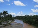 Reflective Blue Sky On The Dirty Creek